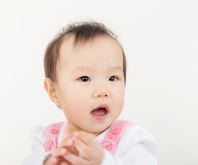 Baby girl clapping hand