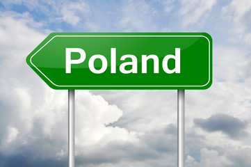 Green arrow sign post Poland