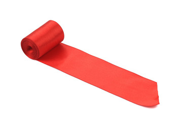 Red silk ribbon roll.
