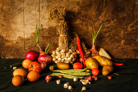 Still life photography with spices, herbs, vegetables and fruits