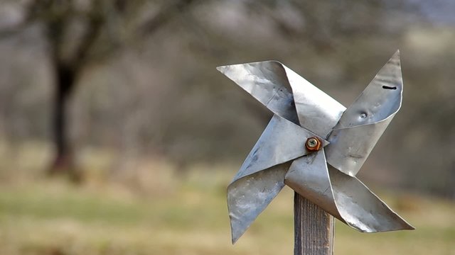 Homemade pinwheel of sheet metal is ugly and dysfunctional