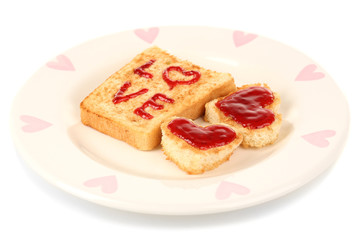 Delicious toast with jam on plate isolated on white
