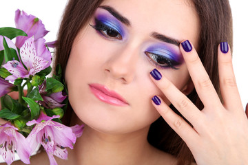 Fototapeta premium Beautiful young woman with flowers close up