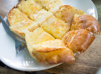 Bread toast and condensed milk with sugar