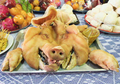 Boiled pig head for sacrifice and vow