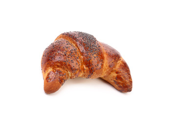 Appetizing croissant with poppy.