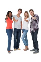 Obraz premium Casually dressed young people gesturing thumbs up