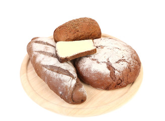 Various healthy bread on a wooden tray.
