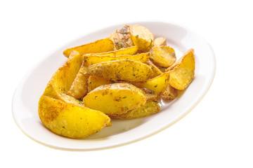 roasted potato wedges on a white plate