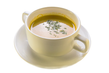 fresh pea soup in a white plate