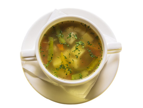 vegetable soup poured in white plate