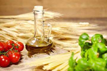 Raw pasta,vegetables ,olive oil and spices