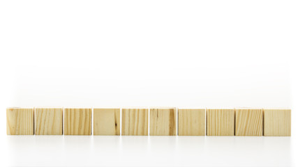Row of ten blank wooden blocks