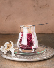 salad of boiled beets with garlic in glass on silver  tray