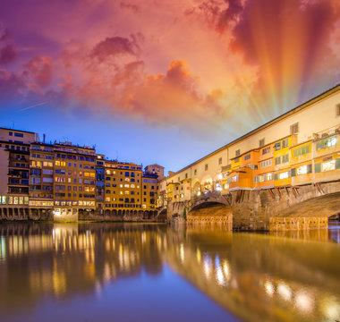 Florence. Arno river and Ponte Vecchio at dusk