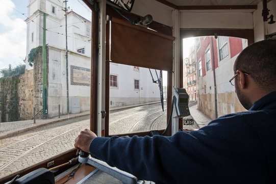 interior view of tram conductor in Lisbon, Portugal.