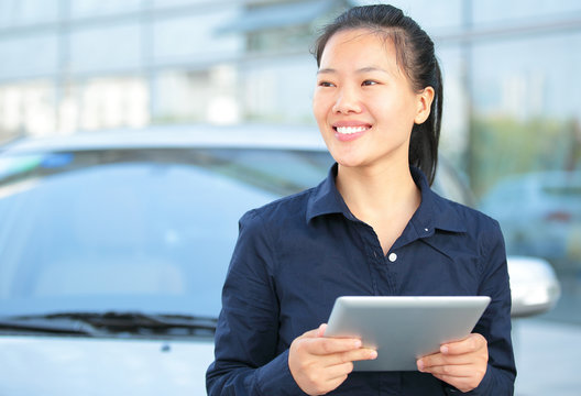 Young Asian Business Woman Use Digital Tablet 