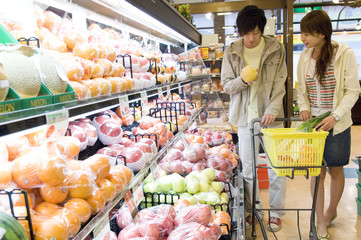 couple doing some shopping in supermarket