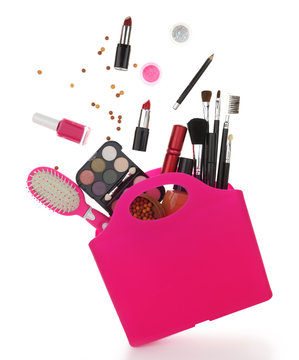 Pink Shopping Bag With Various Cosmetics Isolated On White