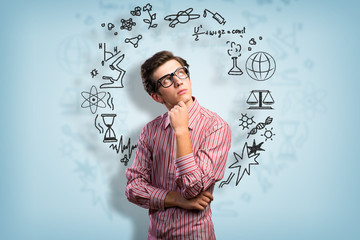 young man scientist with glasses thinking