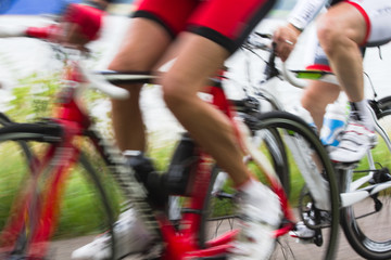 Fototapeta na wymiar Racing cyclists at high speed