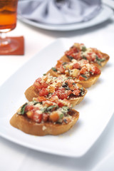 france bread and tomato on white table