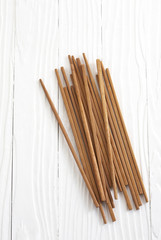 wooden chopstick on white table
