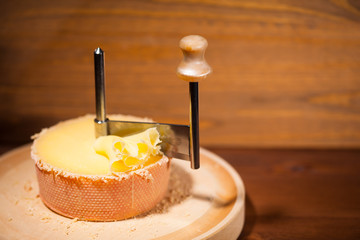 swiss cheese with girolle knife