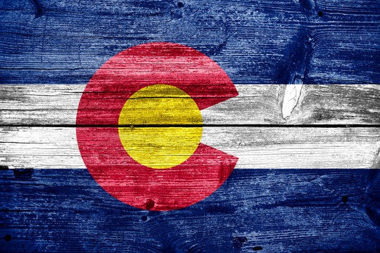 Colorado State Flag painted on old wood plank texture