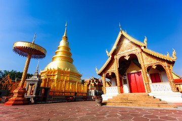 Golden pagoda at Buddhist temple in Thailand.