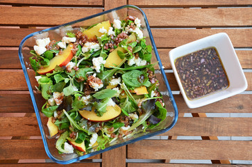 Spinach salad with goat cheese, nectarines and challot dressing