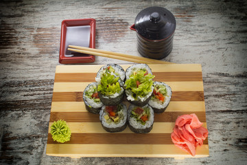 Sushi roll on a vintage background