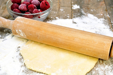 dough, rolling pin and mincemeat cherries