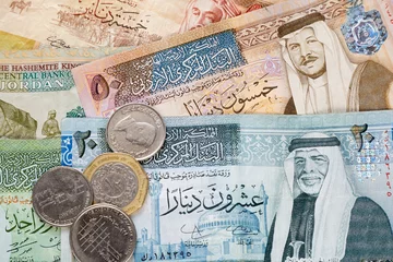Photo sur Aluminium moyen-Orient Fond de billets et pièces de monnaie en dinar jordanien