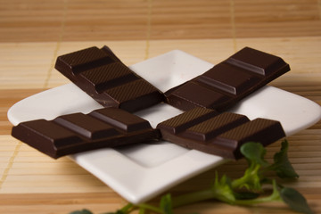 four dark chocolate bars