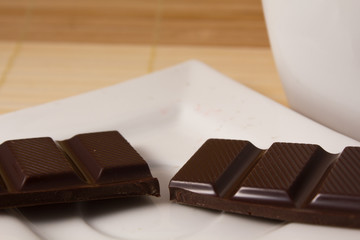 two dark chocolate bar close