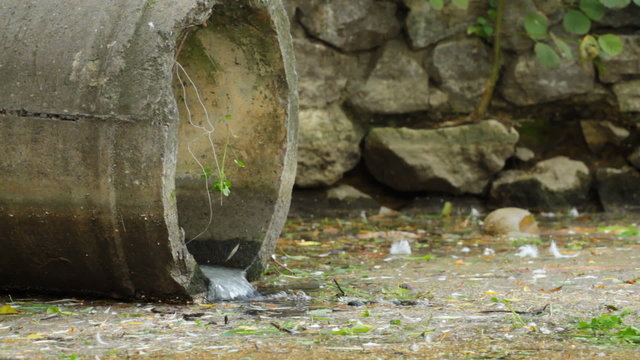 Water flowing from a drainage pipe.