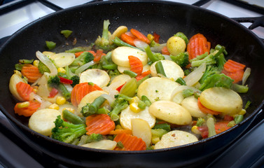 mixed vegetables cooked on a frying pan