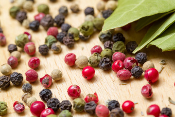 Dry bay laurel leaf with multicolored peppercorn