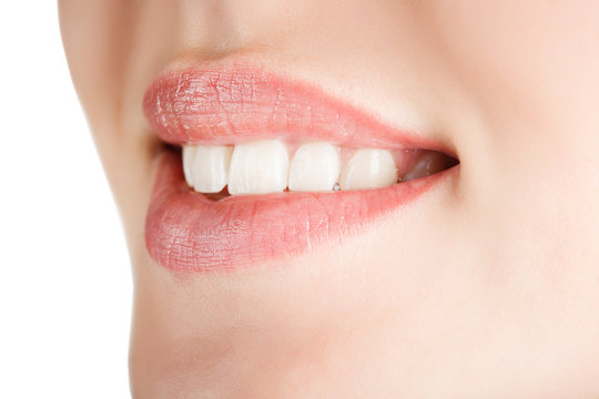 Teeth of a smiling young woman,tilted