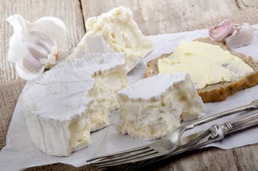 french camembert on white paper