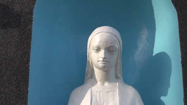 Virgin Mary Statue in old cemetery