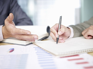 business people reviewing sales performance