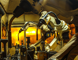 Welding robots in factories industrial