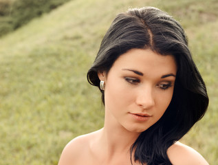 Naklejka premium Beautiful amused young woman