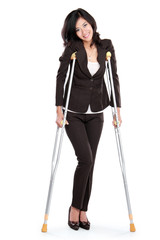 business woman with crutches