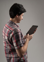 man using a tablet computer