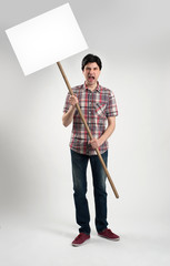 Protesting man with placard