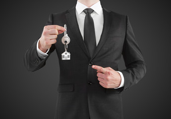 Fototapeta premium businessman giving a key