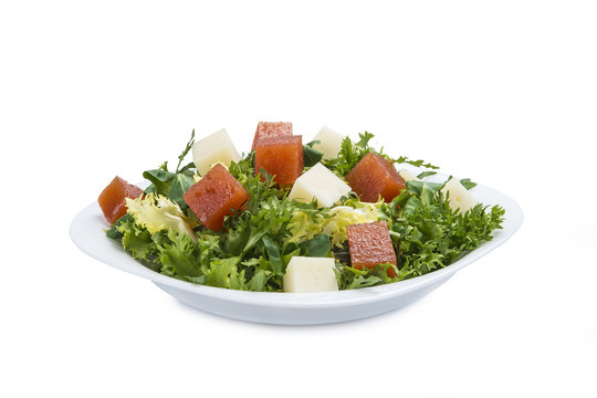 Ensalada de queso de cabra membrillo can&oacute;nigos r&uacute;cula y escarola